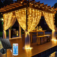 Carica l'immagine nel visualizzatore di Gallery, Holwim Catena di luci a energia solare, 3 x 3 m, 300 LED, IP65, impermeabile, per interni ed esterni, 8 modalità con telecomando, per feste, Natale (bianco caldo solare)