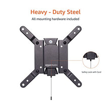 Carica l'immagine nel visualizzatore di Gallery, Amazon Basics, Supporto a parete per TV inclinabile, si adatta a da 12 pollici a 40 pollici e VESA 200 x 200, Nero, da 30.4 cm a 109 cm