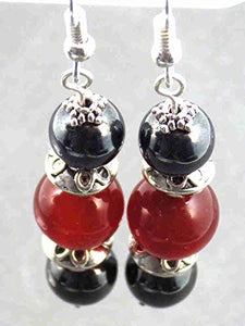 Orecchini di Thurcolas Venezia con perle dell'ematite e dell'agata rossa