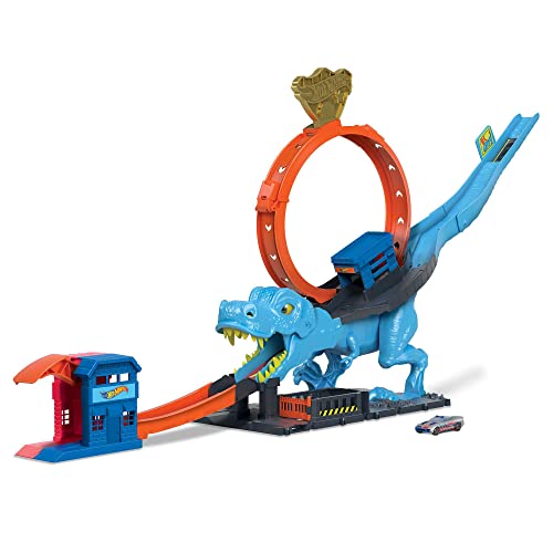 Hot Wheels - Hot Wheels City Pista con 1 macchinina, sfreccia attraverso un loop gigante per sconfiggere il mega dinosauro, acrobatica da corsa con T-Rex, giocattolo per bambini 4+ Anni, HNP77