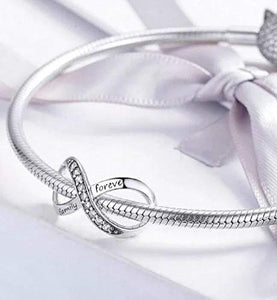 FeatherWish - Ciondolo a forma di infinito con incisione"Family Argento - Ilgrandebazar