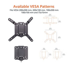 Carica l'immagine nel visualizzatore di Gallery, Amazon Basics, Supporto a parete per TV inclinabile, si adatta a da 12 pollici a 40 pollici e VESA 200 x 200, Nero, da 30.4 cm a 109 cm