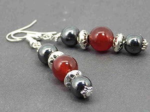 Orecchini di Thurcolas Venezia con perle dell'ematite e dell'agata rossa