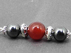 Orecchini di Thurcolas Venezia con perle dell'ematite e dell'agata rossa