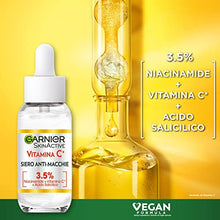 Carica l'immagine nel visualizzatore di Gallery, Garnier Siero Vitamina C Anti-Macchie, Illuminante e Rimpolpante, Arricchito con Vitamina C, Niacinamide e Acido Salicilico, Pelle Libera dalle Macchie Scure in 6 Giorni, Incarnato Luminoso, 30 ml