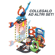 Carica l&#39;immagine nel visualizzatore di Gallery, Hot Wheels - Hot Wheels City Pista con 1 macchinina, sfreccia attraverso un loop gigante per sconfiggere il mega dinosauro, acrobatica da corsa con T-Rex, giocattolo per bambini 4+ Anni, HNP77