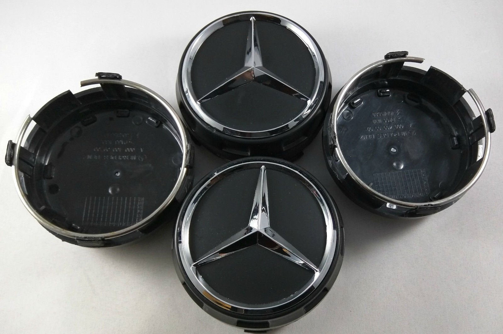 UG 4X Tappi Coprimozzo 75mm Logo Mercedes Nero Rialzato AMG Classe A B –