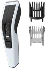 Carica l&#39;immagine nel visualizzatore di Gallery, Philips Tagliacapelli HC3518/15 serie 3000 Tecnologia Trim n Flow, lame DualCut 13 lunghezze 0,5-23mm Bianco