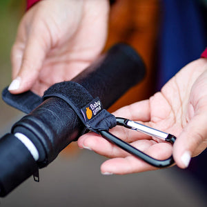 Ganci per Passeggino, Baby Uma - Appendi la spesa & le borse in tutta sicurezza sulla tua Carrozzina o sul Passeggino. Taglia universale, Nero, pacco da 2