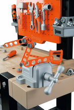 Carica l'immagine nel visualizzatore di Gallery, Tavolo da lavoro da gioco con attrezzi Smoby Black+Decker Bricolo, 91 accessori